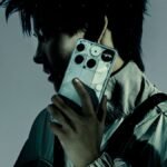 Man holding the transparent Nothing Phone 3 smartphone, showcasing its unique design and Glyph interface.