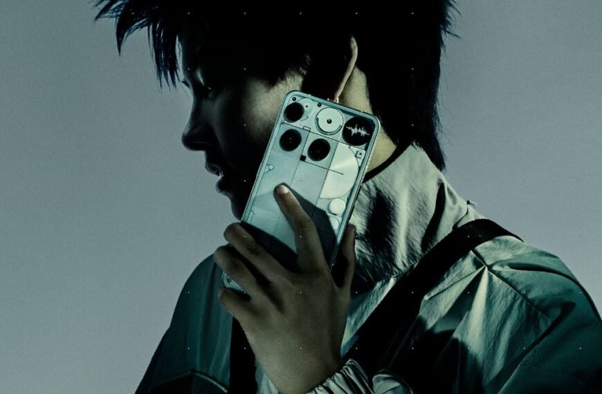 Man holding the transparent Nothing Phone 3 smartphone, showcasing its unique design and Glyph interface.
